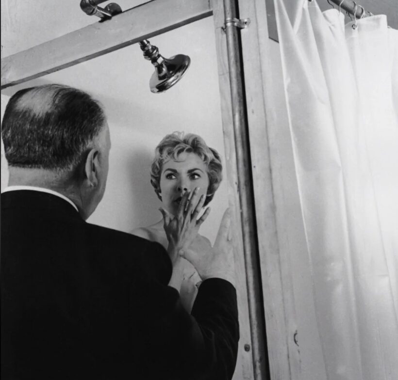 Psycho shower scene still: Alfred Hitchcock and Janet Leigh in the iconic shower scene from Psycho, shaped by Alma Reville’s behind-the-scenes work